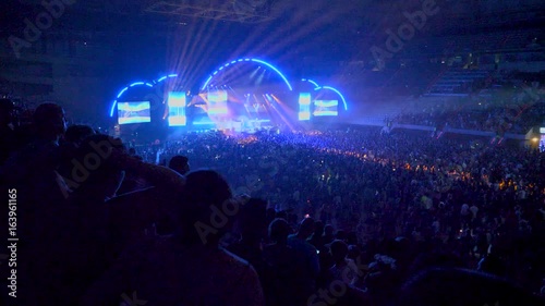 People dancing from the stands in concert in full pavilion 3