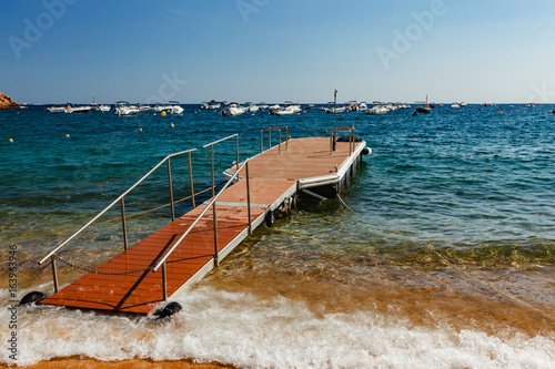 Floating dock in Tossa de Mar photo