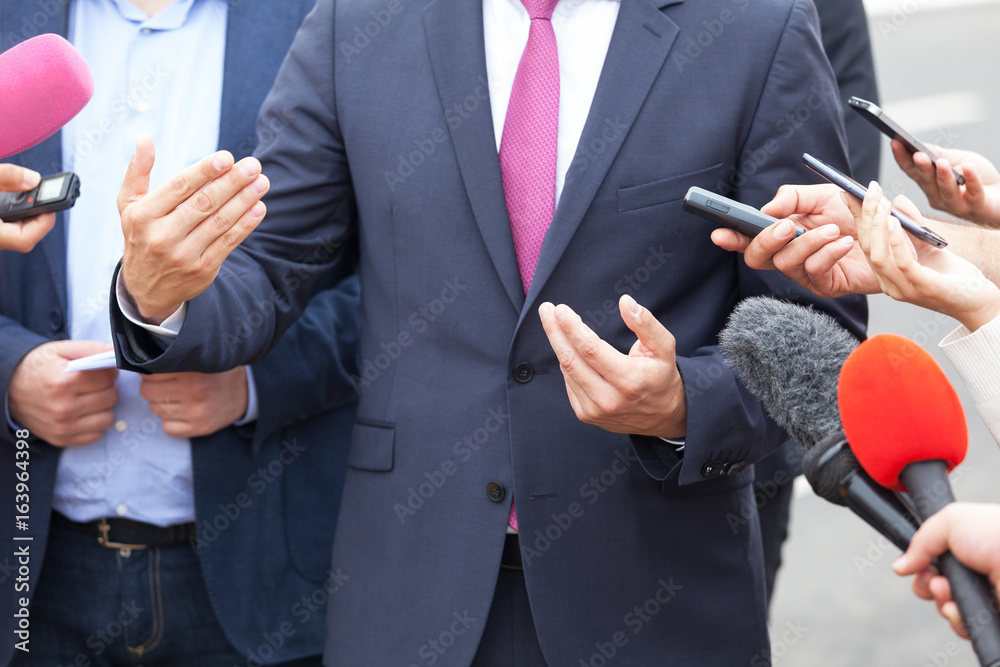 Press interview. Hand gesture. Businessman or politician. Press interview. Hand gesture. Businessman or politician.