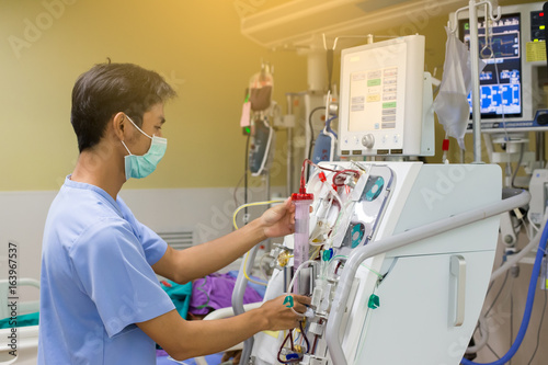 Tableau sur toile The specialist are doing continuous renal replacement therapy equipment and injection pump