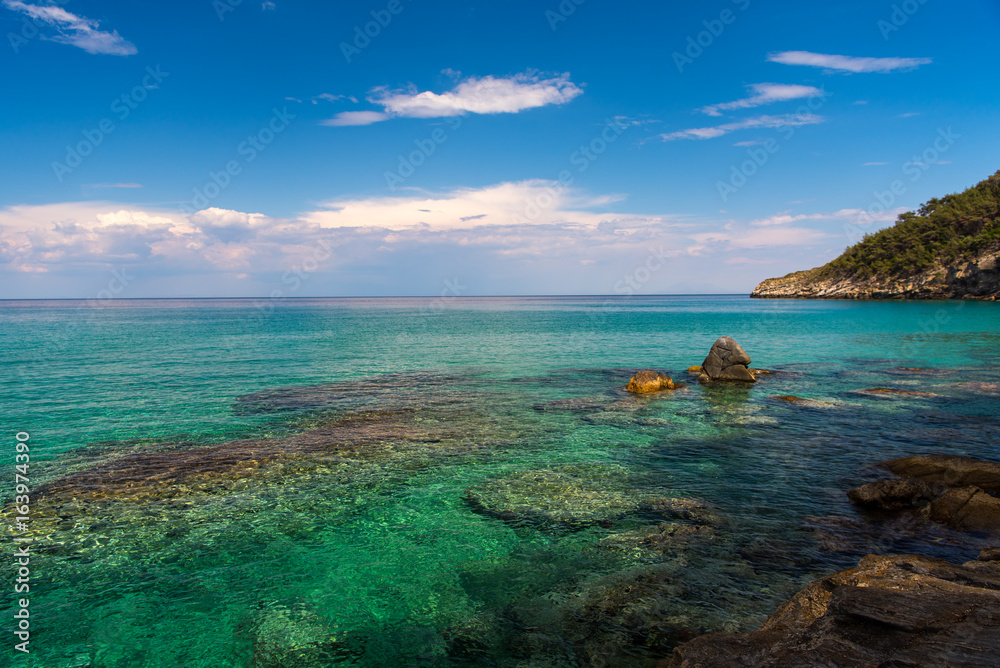 Amazing turquise water on the coast of the beautiful greek island Thasos
