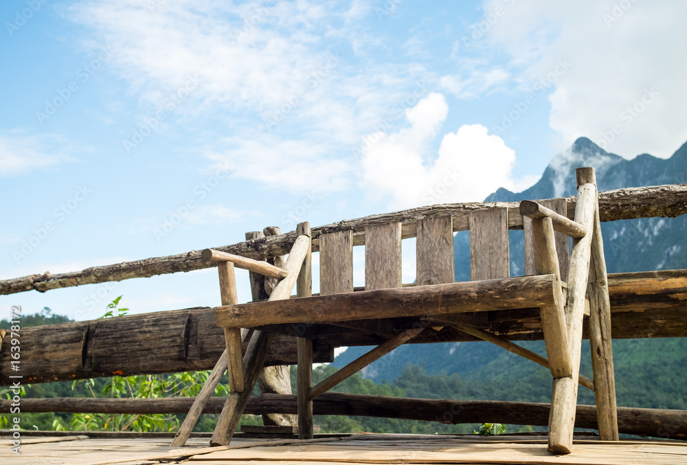 wood balcony terrace  and old wooden chair with mountain view vintage style