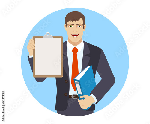 Businessman holding the clipboard and folder