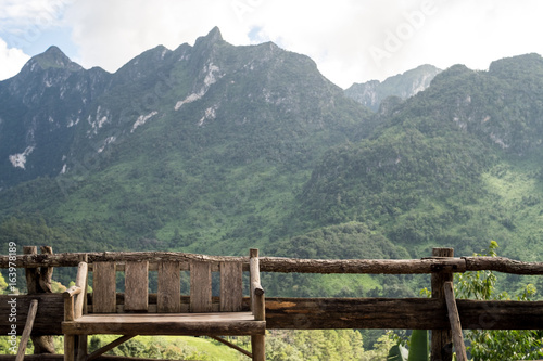 wood balcony terrace and old wooden chair with mountain view vintage style