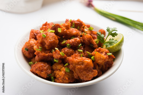 Bilde på lerret Gobi Manchurian dry - Popular street food of India made of cauliflower florets,