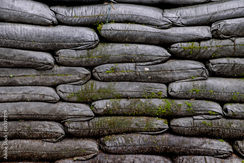 Sandbag bunker texture or Sandbags for flood protection texture background of the old military