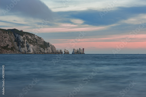 The Needles rocks at Alum Bay on the Isle of Wight, captured at sunset photo