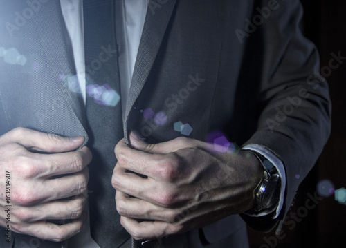 Man in a stylish business suit, closeup © rrudenkois