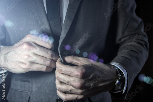 Man in a stylish business suit  closeup