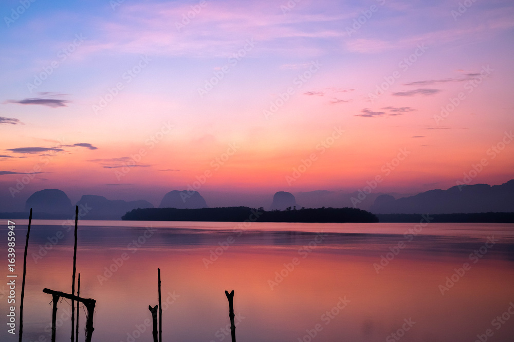 Sun rise yellow tone in the lake