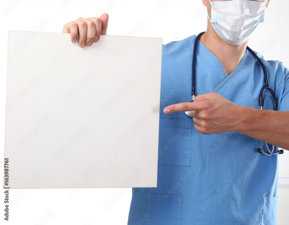 Male doctor showing clipboard with copy space for text Male doctor showing clipboard with copy space for text