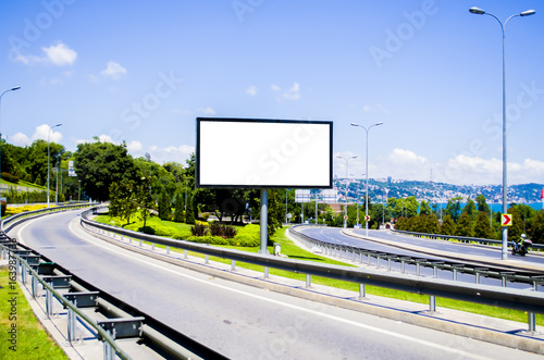 Photography A blank white advertisement board on a motorway
