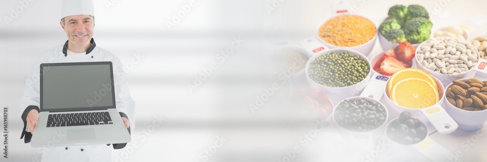 Chef holding laptop with fresh food transition Chef holding laptop with fresh food transition