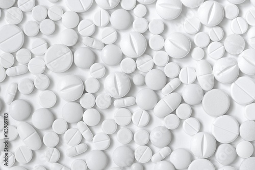 White pills, white background
