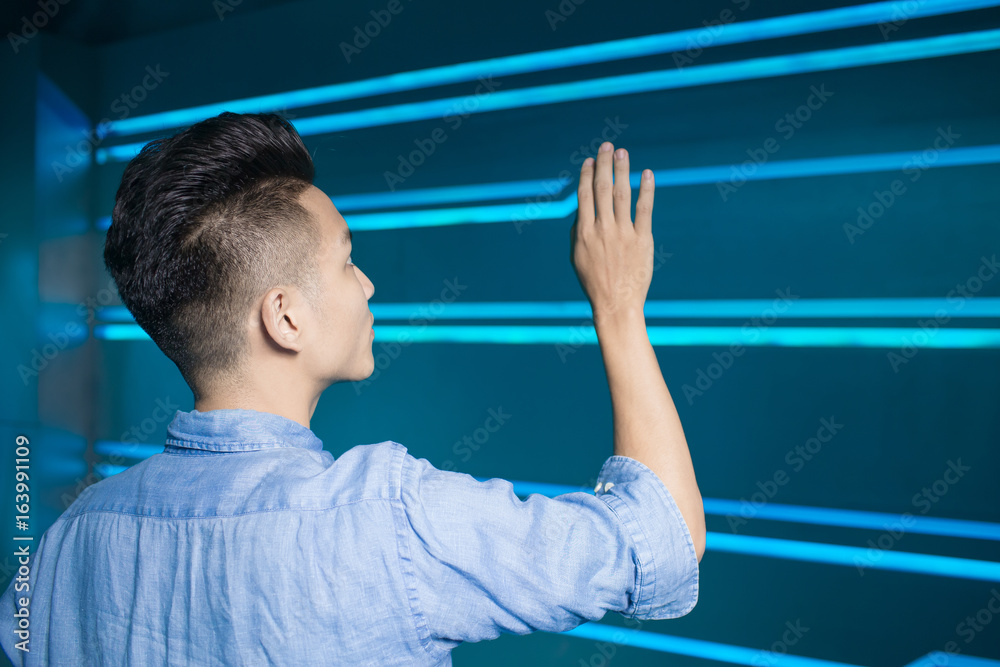man on tech background man on tech background