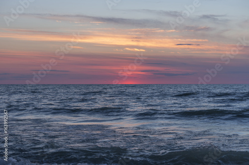 Tranquil red and gold light sky just after sunset