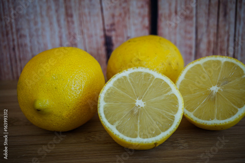 fresh lemon on wooden background