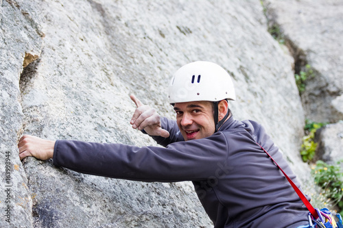 Man feels happy climbing