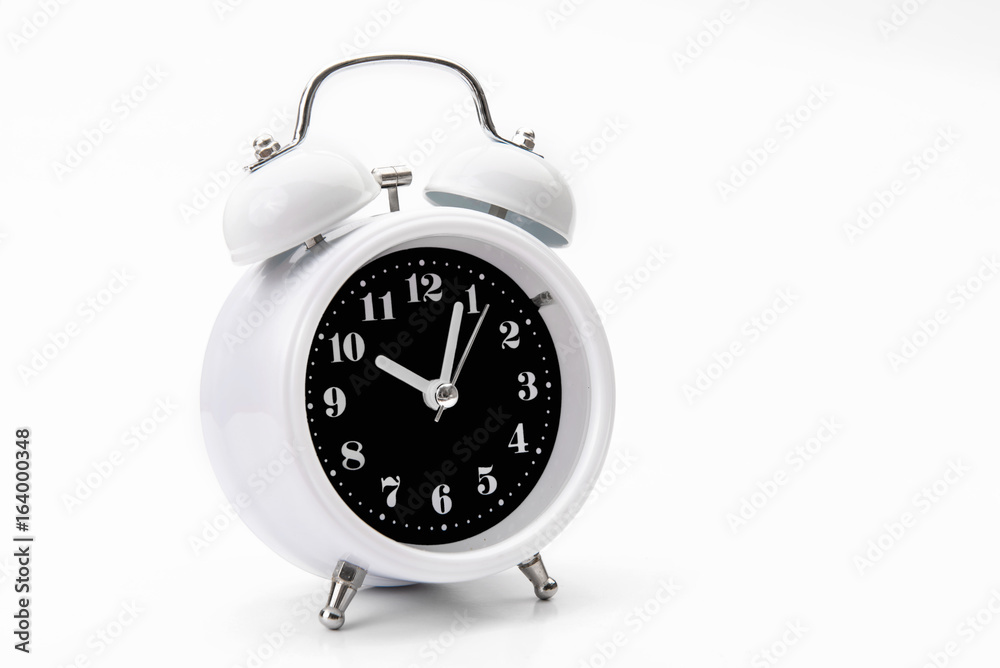 Retro alarm clock isolate on white backgound Retro alarm clock isolate on white backgound
