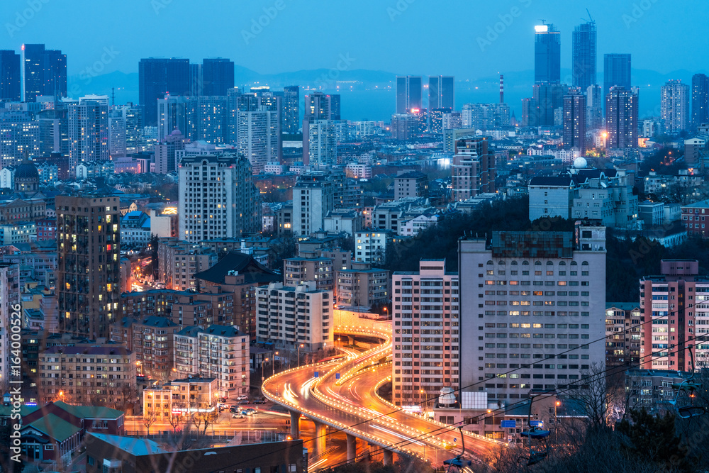 Fototapeta premium city skyline with residential district at night in China.