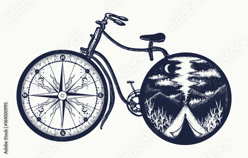 Bicycle tattoo art. Symbol of travel, tourism, adventure, camping. Compass and mountains in bicycle wheels t-shirt design