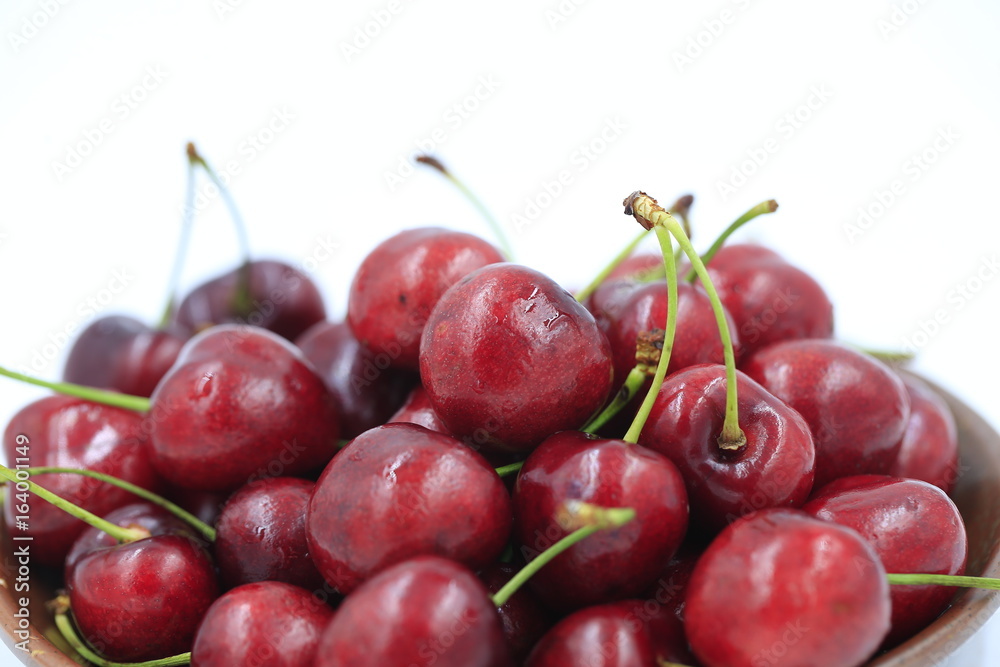 The big cherries are on a white background The big cherries are on a white background
