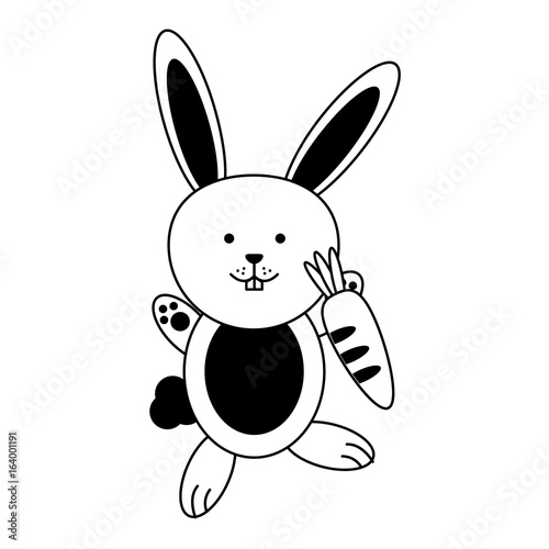 cute rabbit or bunny holding carrot icon image © Jemastock