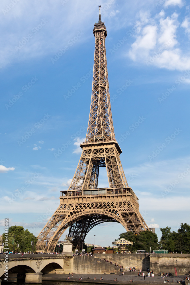 View of the Eiffel Tower in Paris. France. The Eiffel Tower was constructed from 1887-1889 as the entrance to the 1889 World's Fair by engineer Gustave Eiffel.