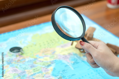 business travel concept ,magnifying glass on map