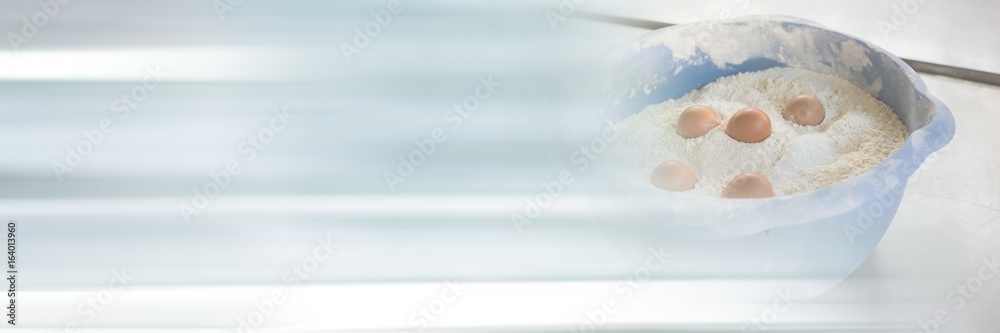 Fotografie eggs in flour bowl transition