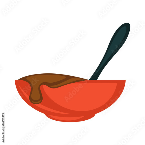 Red bowl with hot melted chocolate and black spoon