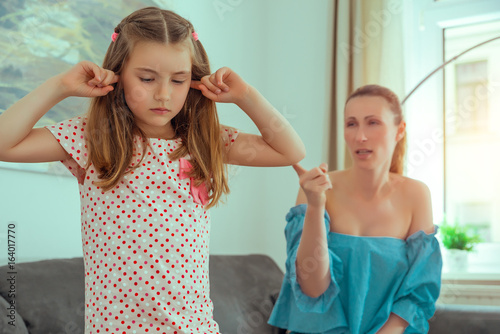 loud mother argue with daughter child