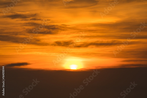sunset time over the golden sky. © Phongsak