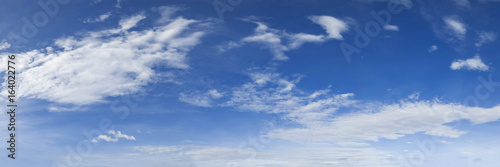 Vibrant color panoramic sun rise and sun set sky with cloud on a cloudy day. Beautiful cirrus cloud. Panorama high resolution photograph.