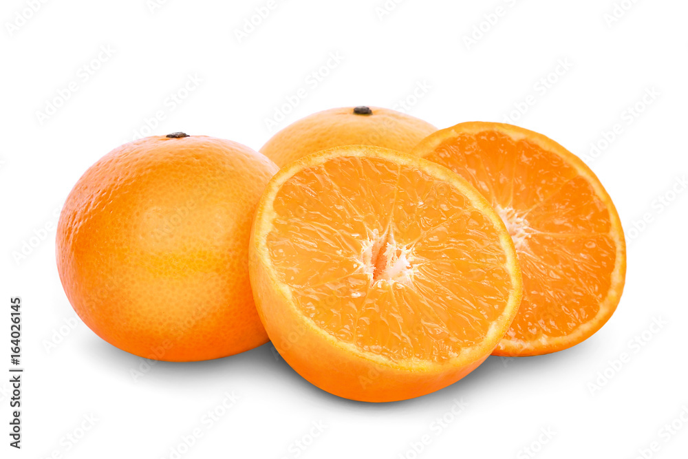 whole and half of mandarin oranges isolated on white background whole and half of mandarin oranges isolated on white background