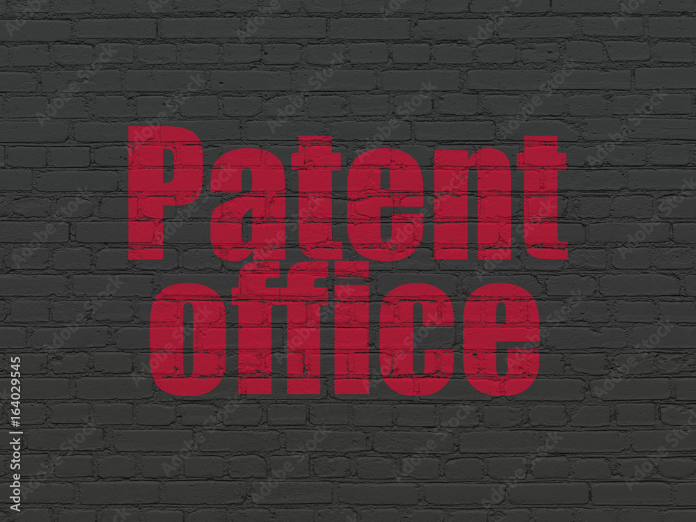 Law concept: Patent Office on wall background Law concept: Patent Office on wall background