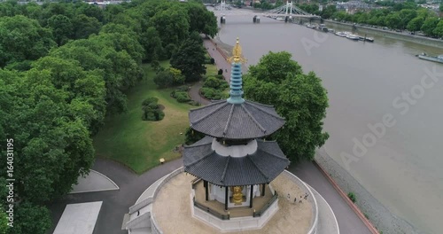 Aerial close up descending view of the peace pagoda in London photo
