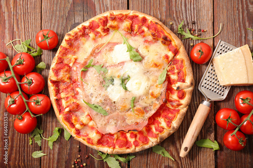 pizza with tomato and parmesan