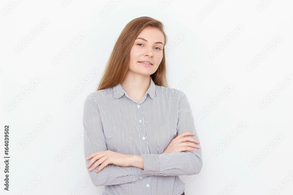 Happy young student girl with folded arms isolated on white background