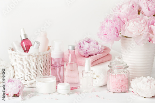 Fototapeta Naklejka Na Ścianę i Meble -  bath and spa with peony flowers beauty products towels