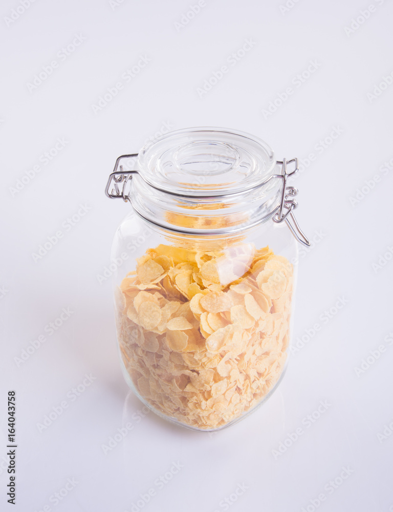 Cornflakes or raw Corn Flakes on a background. Cornflakes or raw Corn Flakes on a background.