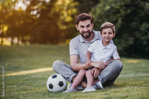 Dad with son playing football © Vasyl