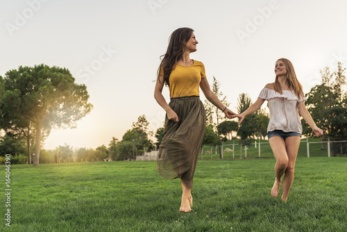 Beautiful women smiling and having fun and running.