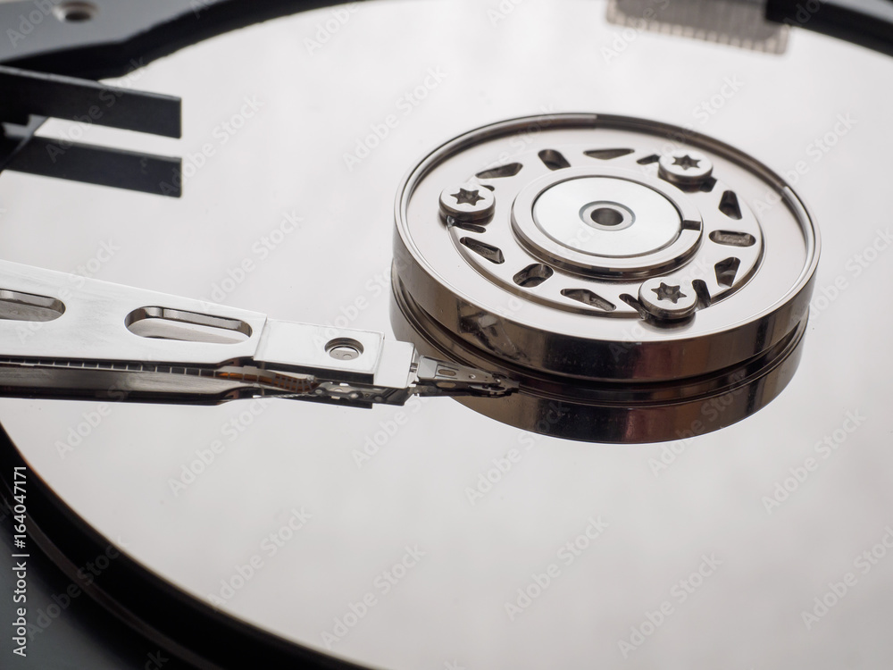Macro shot of the mechanism of the hard drive Macro shot of the mechanism of the hard drive
