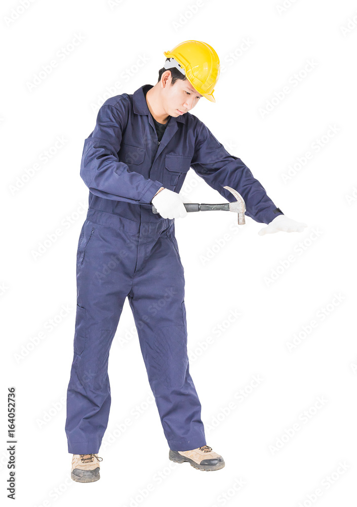 Handyman in uniform with his hammer Handyman in uniform with his hammer