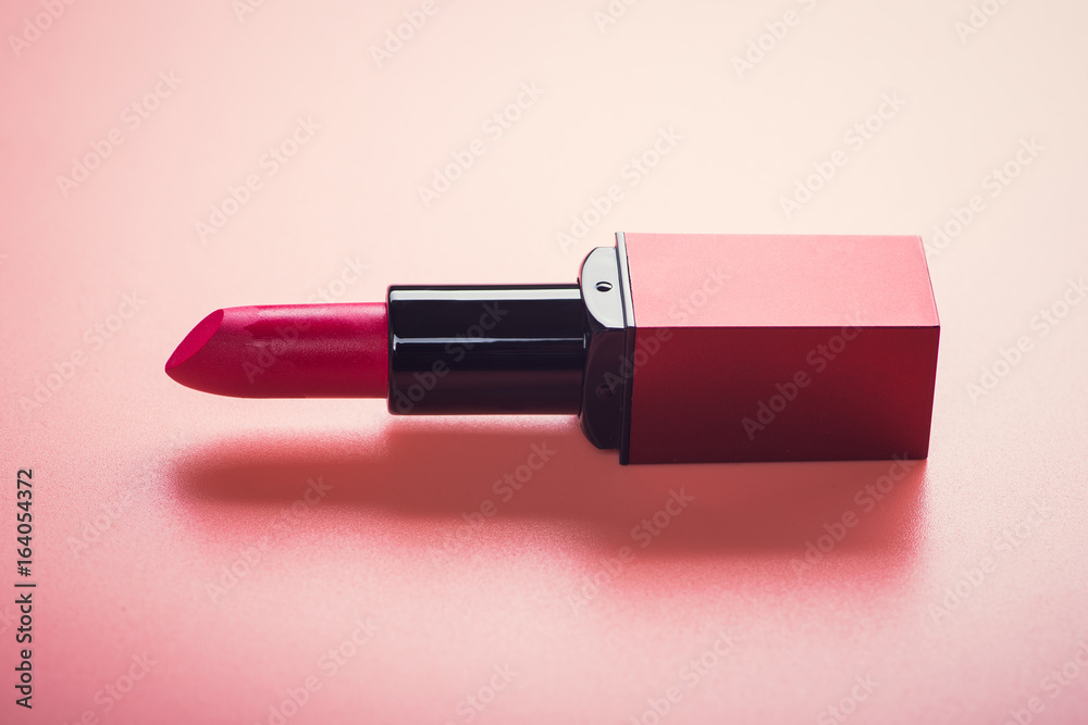 cosmetic red lipstick on pink cosmetic red lipstick on pink