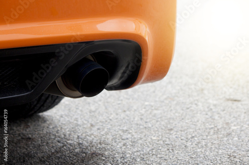 Racing car orange color view on backside have intake. photo