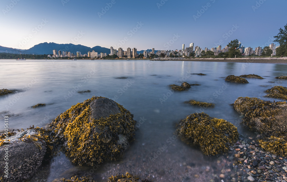 Vancouver skyline at blue hour  as seen from Kitsilano beach