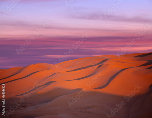 Sand dunes at sunset in Sahara desert in Morocco, Africa