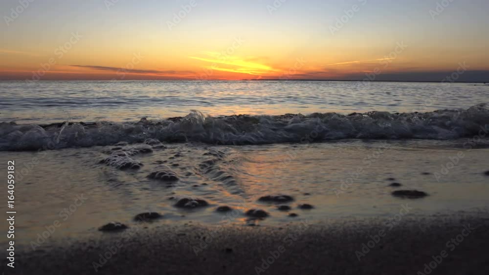 Sea Waves rolling On A Empty Sandy Beach Sea Waves rolling On A Empty Sandy Beach